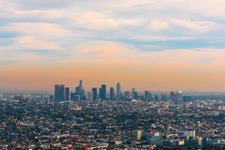 View of a city skyline with smog layer in the morning